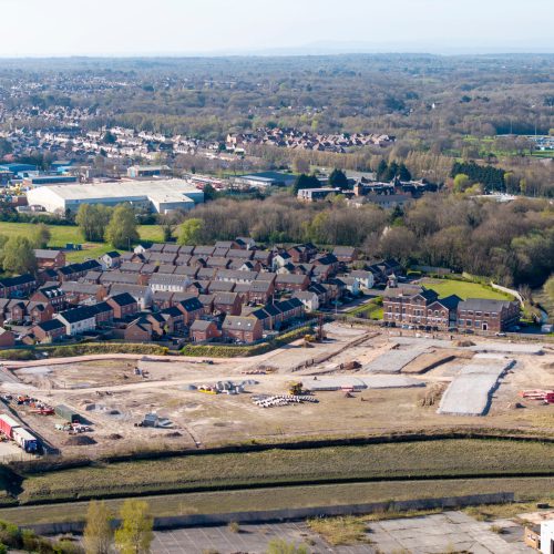 Aerial view of plot of land on brownfield site for building new houses in Merseyside, England